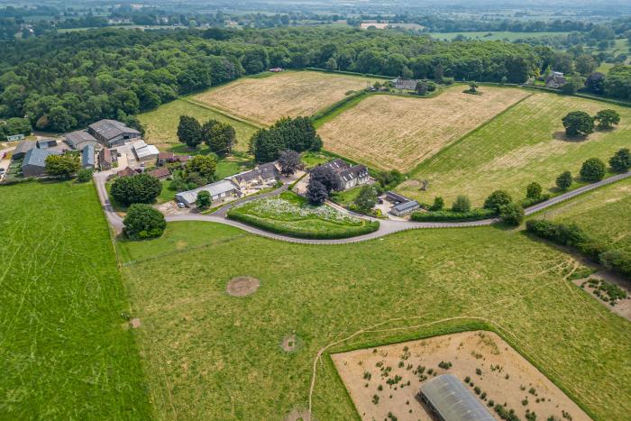 Leafield House in Upper Seagry, Wiltshire. Hot tub. Cinema room. Library. Freestanding bath. Luxury.