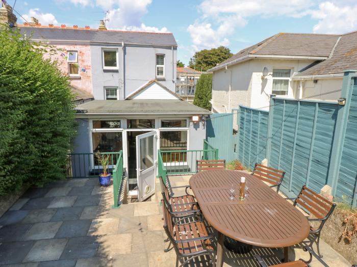 7 Hope Road rests in Shanklin, upon Isle of Wight. Three-bedroom home with sea glimpses. Near beach.