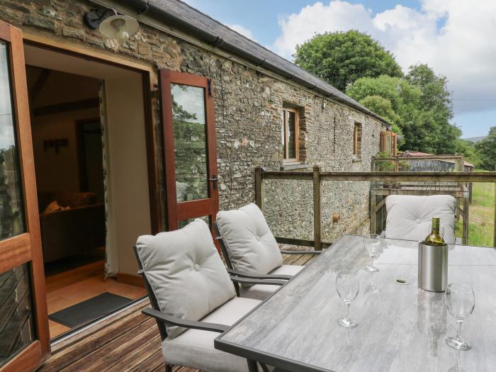 Nant Glas is nr Lampeter, Carmarthenshire. Two-bedroom cottage with private balcony and rural views.