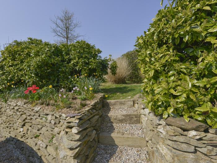 Blake Cottage, is in Pelynt, Cornwall. Enclosed garden. Parking. Couples retreat. Woodburning stove.