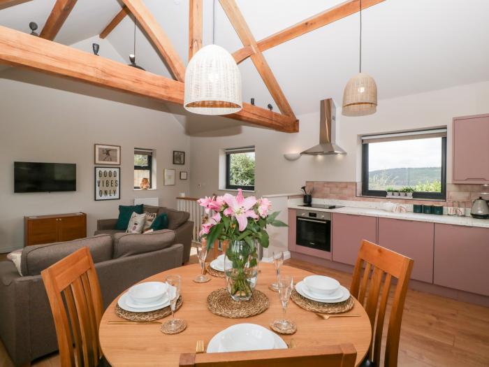 Sevenwoods View in Longhope, Gloucestershire, reverse-level, dog-friendly, off-road parking, garden.