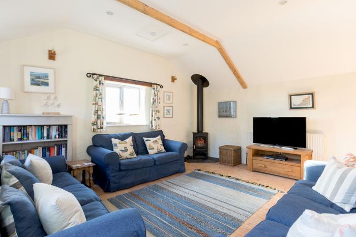 The Barn, St. Minver in St Minver, Cornwall. Close to amenities and a beach. Woodburning stove. Pets