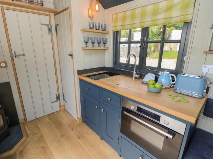 Malbec is near Seaview, Isle of Wight. One-bed shepherd's hut, ideal for couples. Woodburning stove.