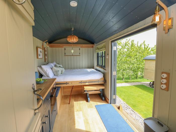 Malbec is near Seaview, Isle of Wight. One-bed shepherd's hut, ideal for couples. Woodburning stove.