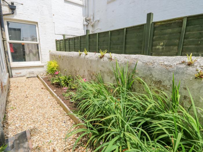 34 Station Avenue in Sandown, Isle of Wight. Pet-friendly. Near beach and amenities. Enclosed garden