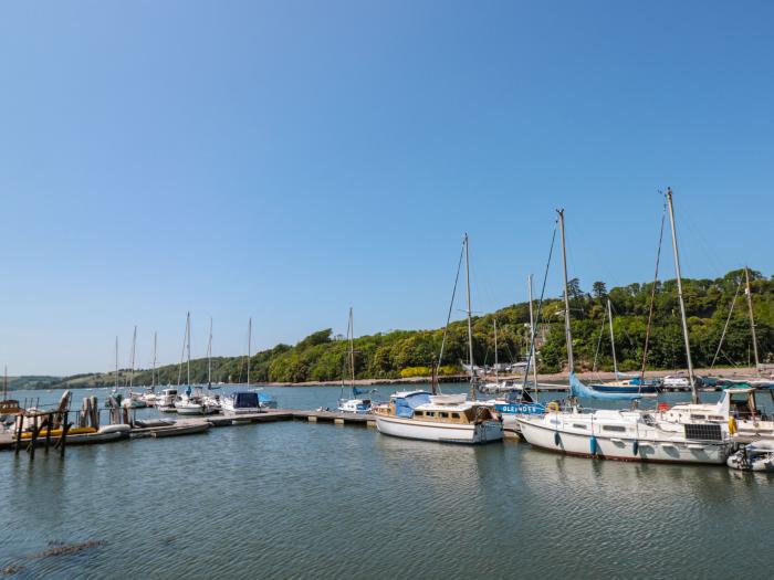 Cliff Cottage rests in Galmpton, Devon. Five-bedroom home with stunning views over River Dart. Large