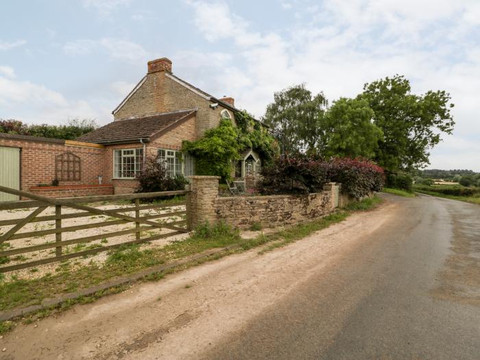 The Old Lodge is in Dymock near Newent, Gloucestershire, woodburning stove, off-road parking, 2beds.
