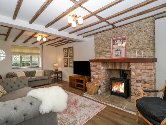 The Old Lodge is in Dymock near Newent, Gloucestershire, woodburning stove, off-road parking, 2beds.