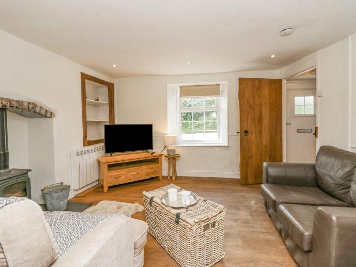 Nans Cottage, is in Spark Bridge, in Cumbria. In National Park. Two-bedroom cottage. Pets welcomed.