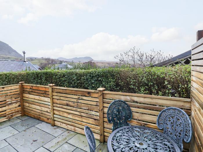 3 Tanyrhos, Blaenau Ffestiniog, Gwynedd. Stone-built, terraced cottage. Surrounding mountain vistas.