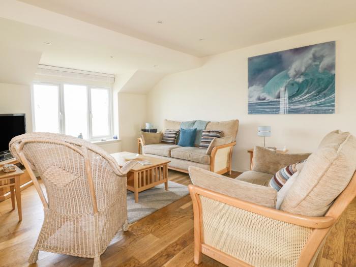 6 The Watermark in Porth, Cornwall. Semi-detached. Reverse level accommodation. Beach nearby. 3-beds