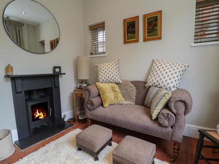 Hangmans Cottage is in Horncastle, Lincolnshire. Character. Smart TV. Woodburning stove. One bedroom