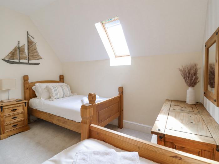 Tan Yr Allt, is near Meifod, Powys, Wales, lakeside, off-road parking, hot tub, woodburning stove.