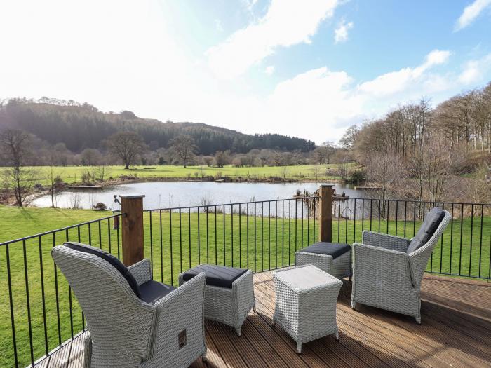 Tan Yr Allt, is near Meifod, Powys, Wales, lakeside, off-road parking, hot tub, woodburning stove.