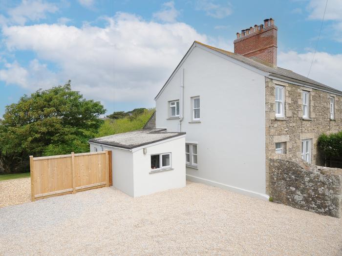 Carvannel Cottages, Portreath, Cornwall. Three bedrooms. Pet-friendly. Enclosed garden with hot tub.