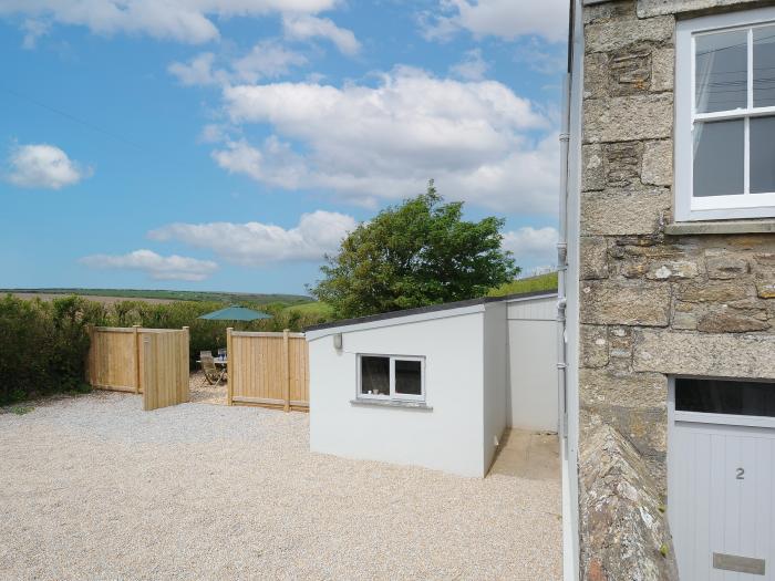 Carvannel Cottages, Portreath, Cornwall. Three bedrooms. Pet-friendly. Enclosed garden with hot tub.