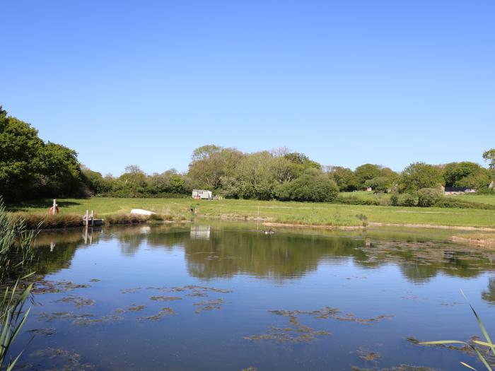 The Parlour near Cardigan, Ceredigion. Ideal for couples. Pet-friendly. Woodfired hot tub. Open-plan