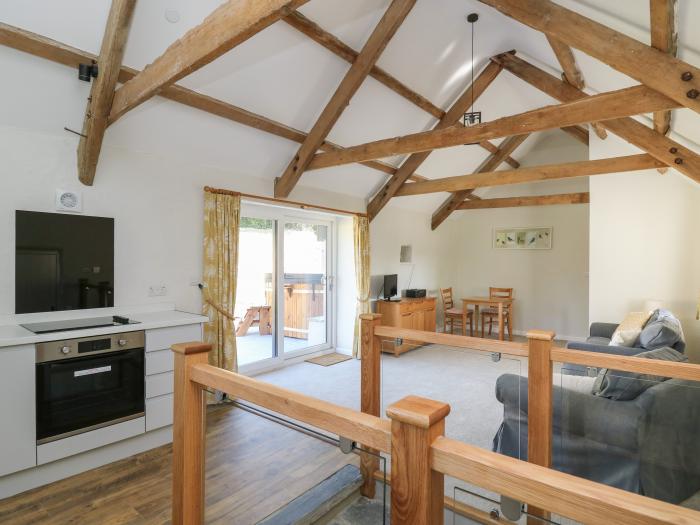 The Parlour near Cardigan, Ceredigion. Ideal for couples. Pet-friendly. Woodfired hot tub. Open-plan