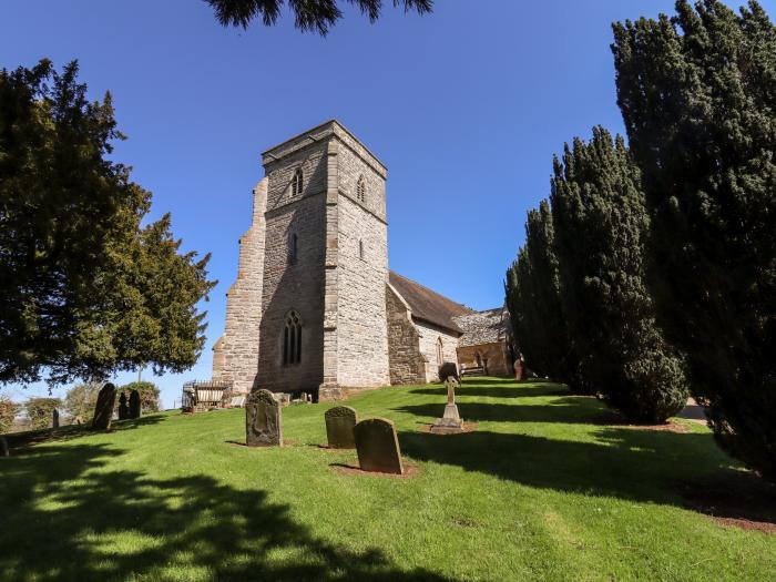 The Alms Houses in Tewkesbury, Gloucestershire. Pet-friendly, serene location and distant hill views