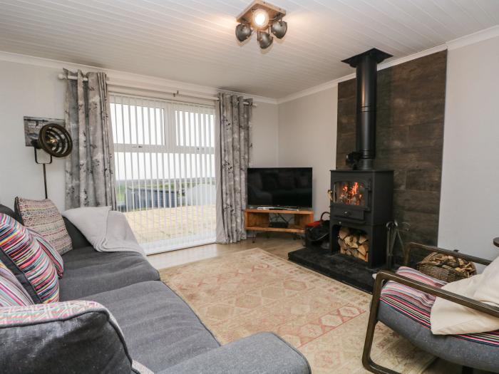 The Chalet is near Egremont, Cumbria. Single-storey chalet, overlooking Isle of Man. Pet-free. Rural