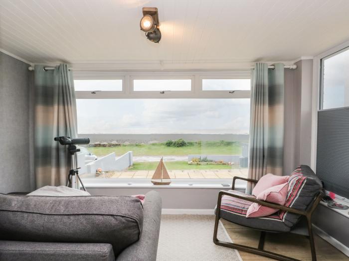 The Chalet is near Egremont, Cumbria. Single-storey chalet, overlooking Isle of Man. Pet-free. Rural