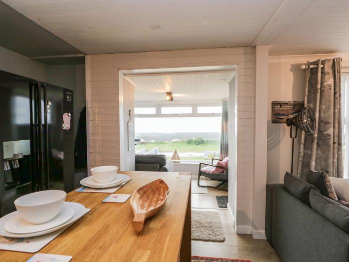 The Chalet is near Egremont, Cumbria. Single-storey chalet, overlooking Isle of Man. Pet-free. Rural