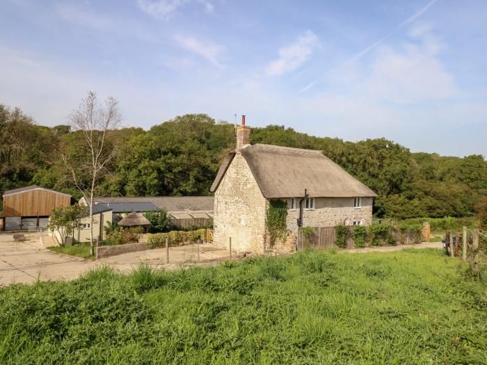 Dairy Cottage nr Abbotsbury, Dorset. Three-bedroom, thatched cottage with rural views. Pet-friendly.