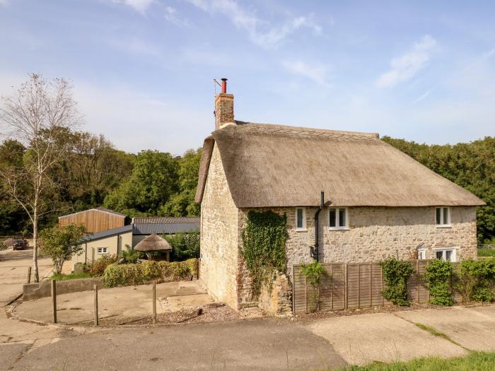 Dairy Cottage nr Abbotsbury, Dorset. Three-bedroom, thatched cottage with rural views. Pet-friendly.