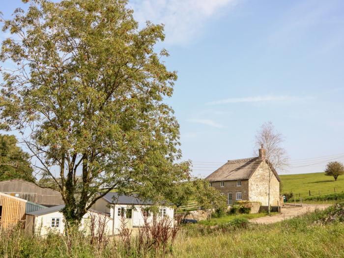 Dairy Cottage nr Abbotsbury, Dorset. Three-bedroom, thatched cottage with rural views. Pet-friendly.