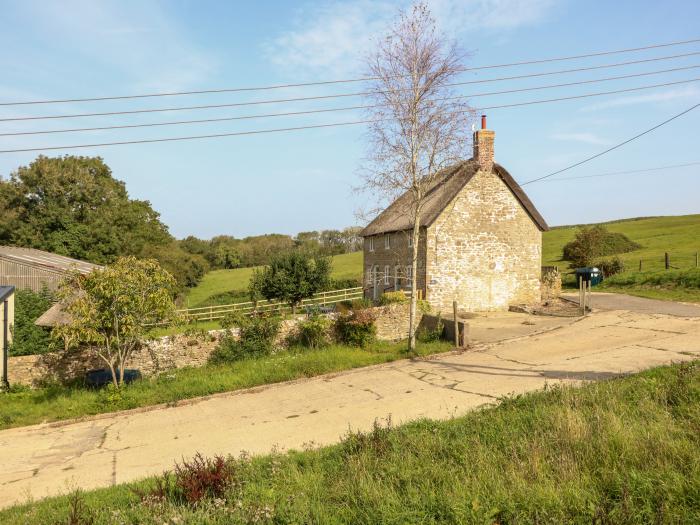 Dairy Cottage nr Abbotsbury, Dorset. Three-bedroom, thatched cottage with rural views. Pet-friendly.