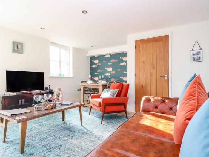 The Old Smokehouse, in Charlestown, Cornwall. Pet-friendly. Enclosed garden. Open-plan living. 2bed.
