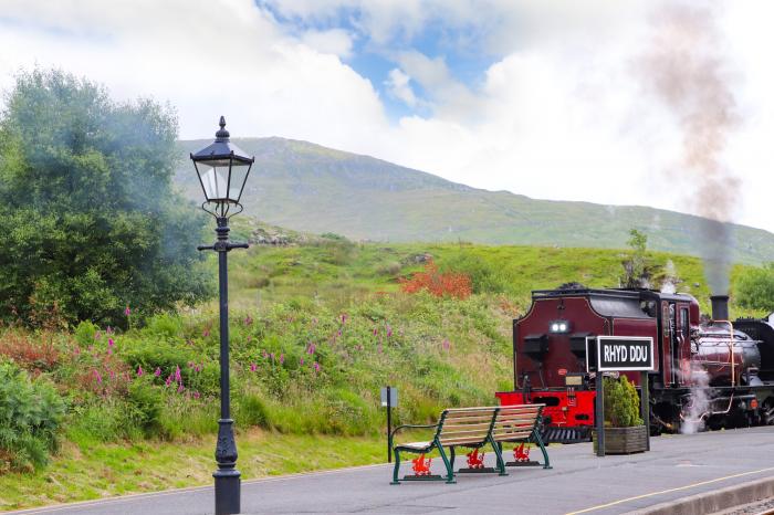 Tan Y Coed in Nasareth near Penygroes, Gwynedd, woodburning stove, off-road parking, Smart TV, WiFi.