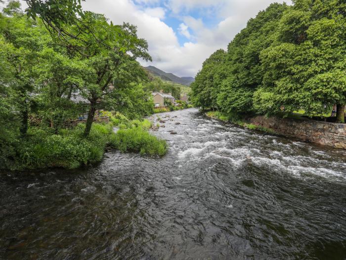 Tan Y Coed in Nasareth near Penygroes, Gwynedd, woodburning stove, off-road parking, Smart TV, WiFi.