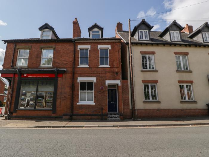 2 High Street, Newent, Gloucestershire. Mid-terrace townhouse. Over three floors. Enclsoed courtyard