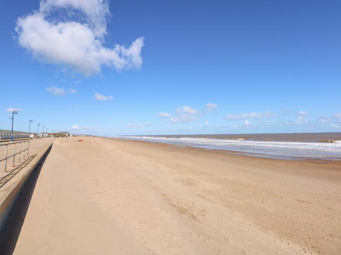 The Beach House in Mablethorpe in Lincolnshire. Close to amenities and beach. Garden with hot tub.