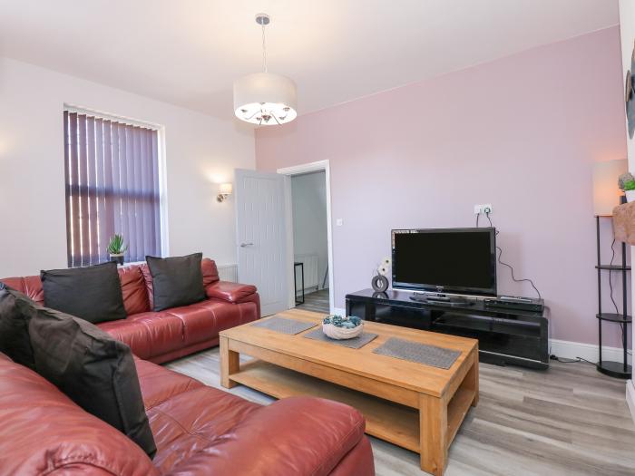 The Beach House in Mablethorpe in Lincolnshire. Close to amenities and beach. Garden with hot tub.