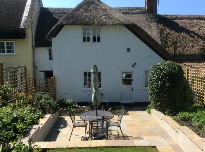 78 Mill Street in Burton Bradstock, Dorset. In AONB and near the coast. Thatched, 2 bedroom cottage.