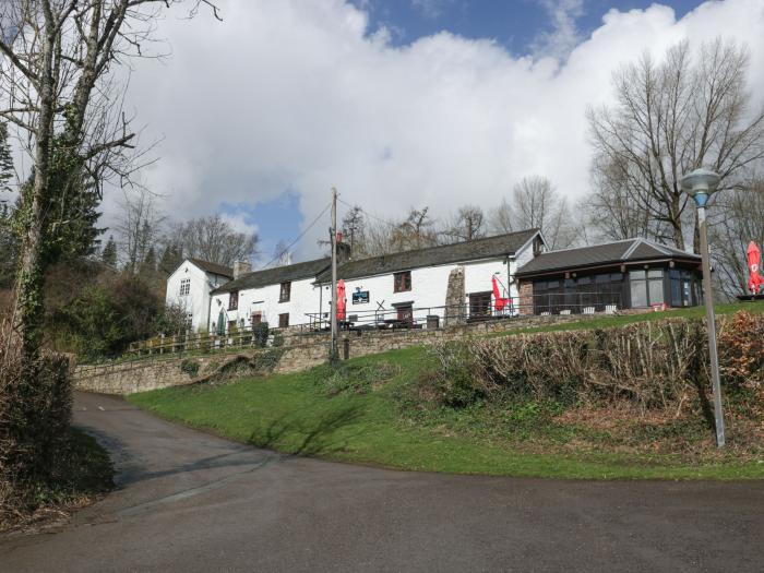 Aqueduct Cottage in Llanover, Monmouthshire. Pet-friendly. Enclosed garden. Woodburning stove. WiFi.