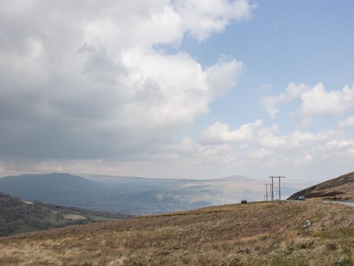 Aqueduct Cottage in Llanover, Monmouthshire. Pet-friendly. Enclosed garden. Woodburning stove. WiFi.