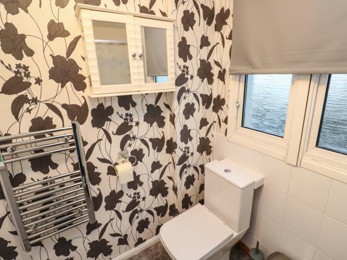 Lamorna is in Mullion, Cornwall. Close to amenities and a beach. Woodburning stove. Off-road parking