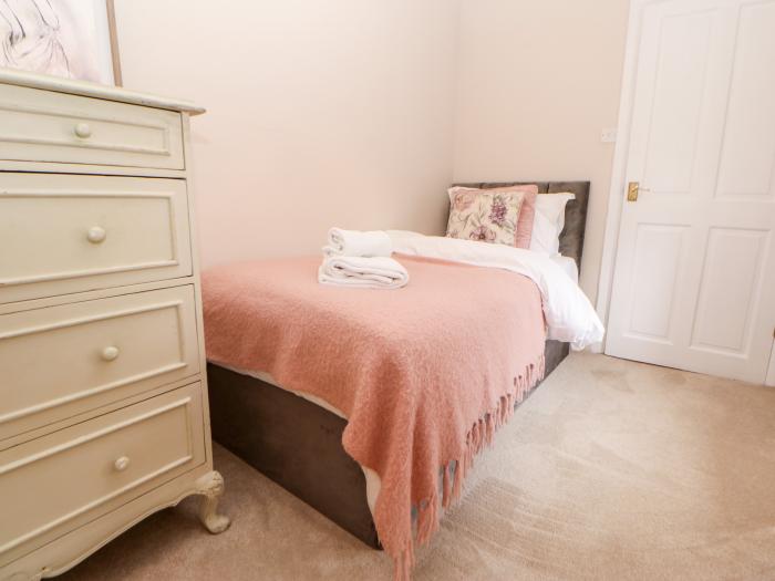 Jasmine Cottage near Richmond, in North Yorkshire. Three-bedroom cottage, with pet-friendly garden.