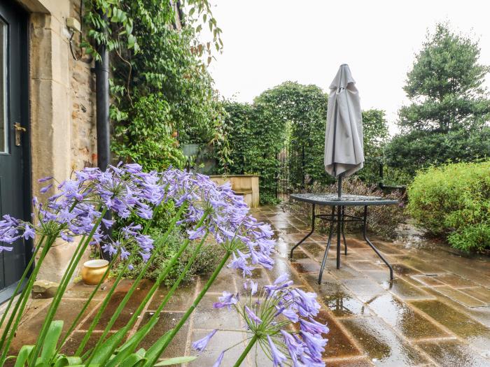 Jasmine Cottage near Richmond, in North Yorkshire. Three-bedroom cottage, with pet-friendly garden.