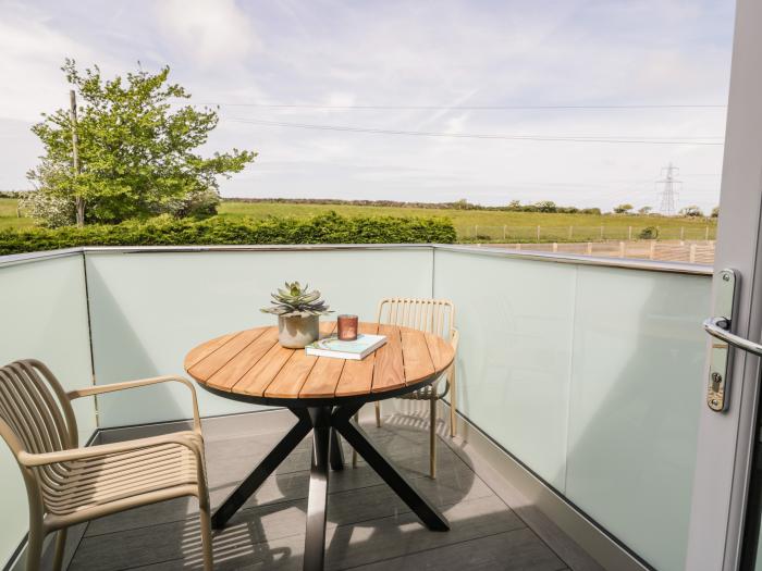 The Hayloft in Llanfechell, in Anglesey. A first-floor, luxury apartment enjoying countryside views.