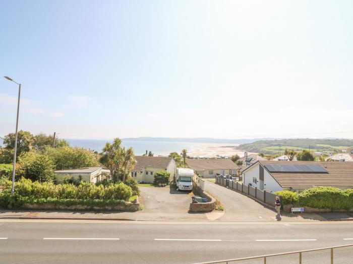 9 Llys Rhostrefor in Benllech, Anglesey, family-friendly, sea views, close to the beach & amenities,