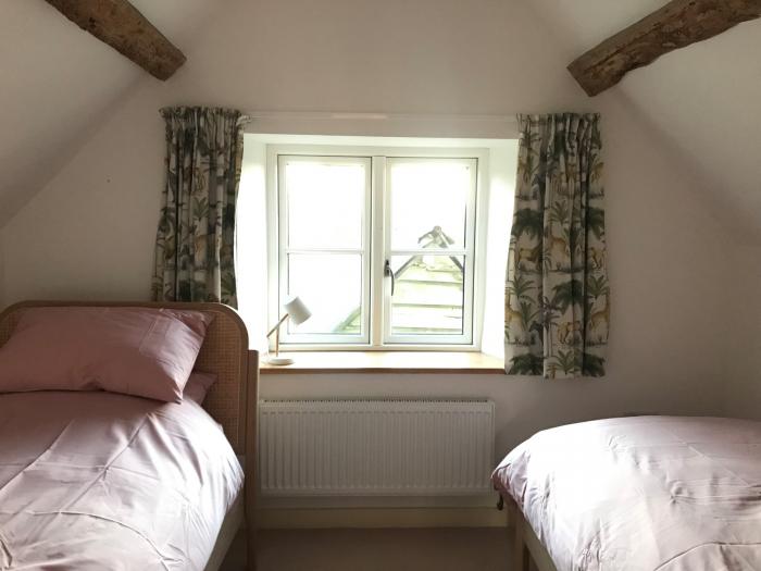 High Cogges Farm Holiday Cottages, Witney, Oxfordshire. Sleeps six guests, accepts two dogs, parking