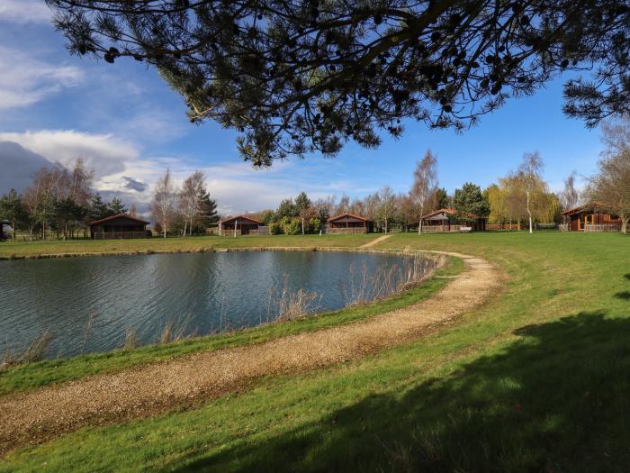 Swan Lodge in Stainfield, Bardney, Lincolnshire, sleeps two guests in one bedroom. One dog, hot tub.