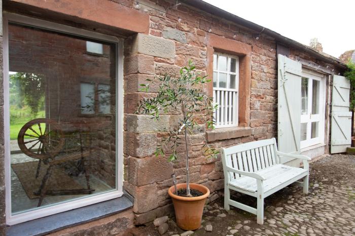 The Courtyard, is near Longtown, in Cumbria. Two-bedroom abode with original features. Pet-friendly.