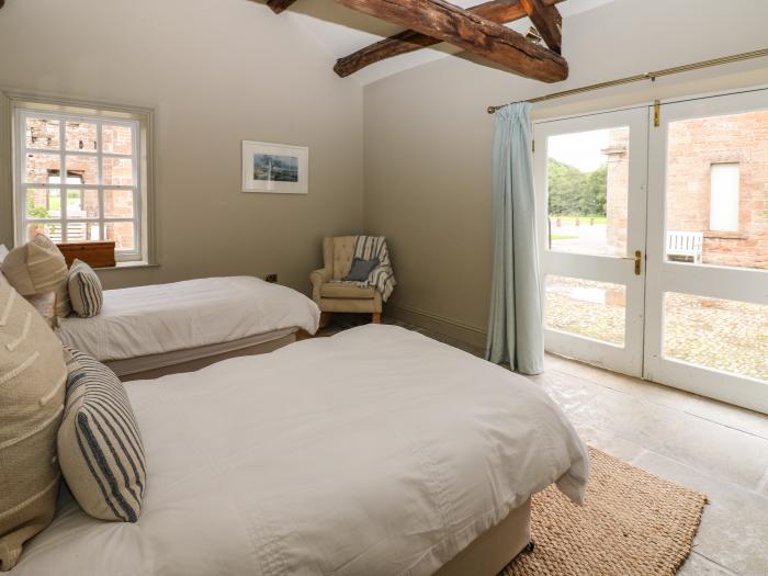 The Courtyard, is near Longtown, in Cumbria. Two-bedroom abode with original features. Pet-friendly.