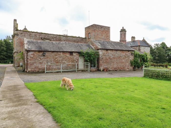 The Courtyard, is near Longtown, in Cumbria. Two-bedroom abode with original features. Pet-friendly.