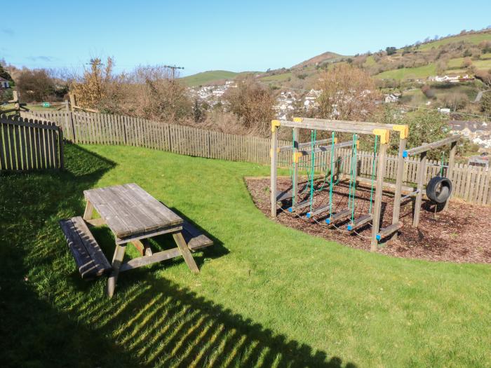 Chalet Log Cabin L12, Combe Martin. Dog-friendly, decking, open-plan living space and close to beach